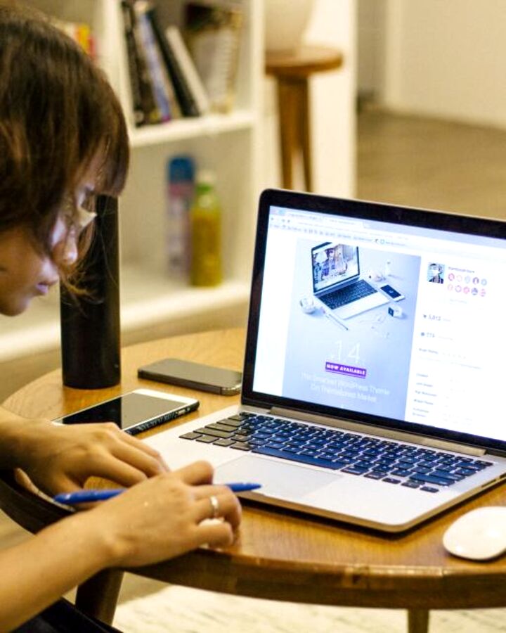 Someone studying in the evening with a laptop